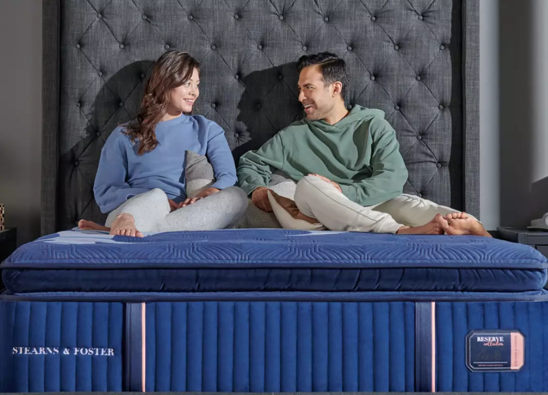 Mattress Financing Image - Couple on their bed.